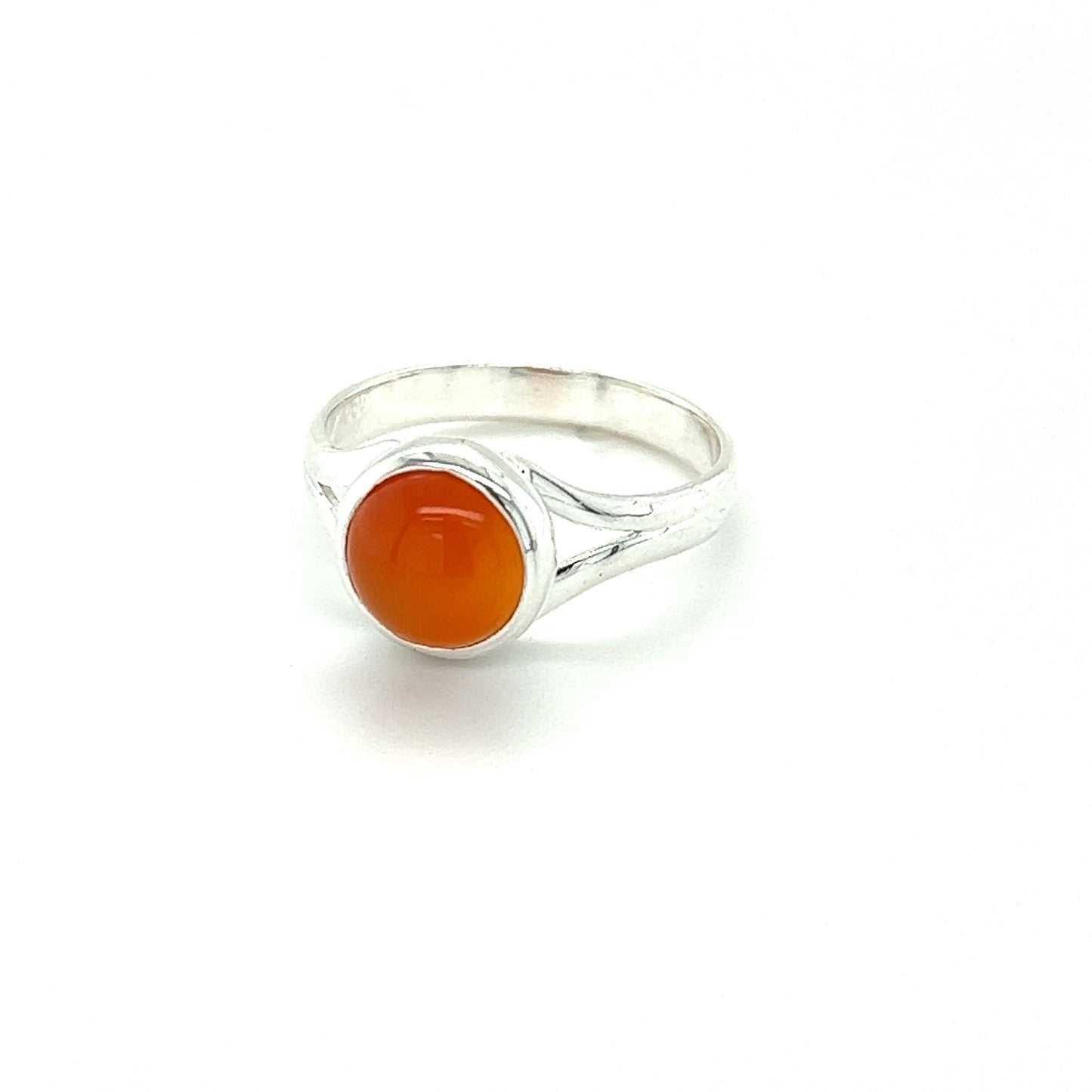 
                  
                    A Simple Vibrant Circular Stone Ring from Super Silver adorned with a natural orange stone.
                  
                