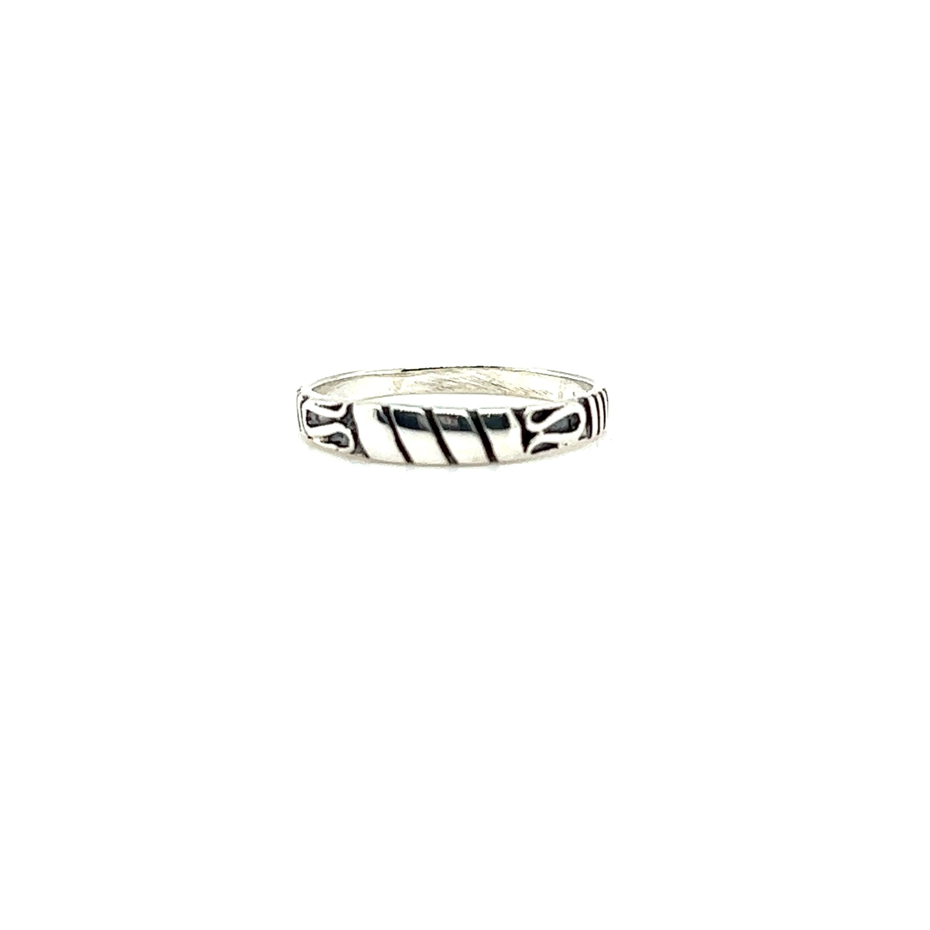A Bali Style Silver Band with black and white designs from Super Silver.