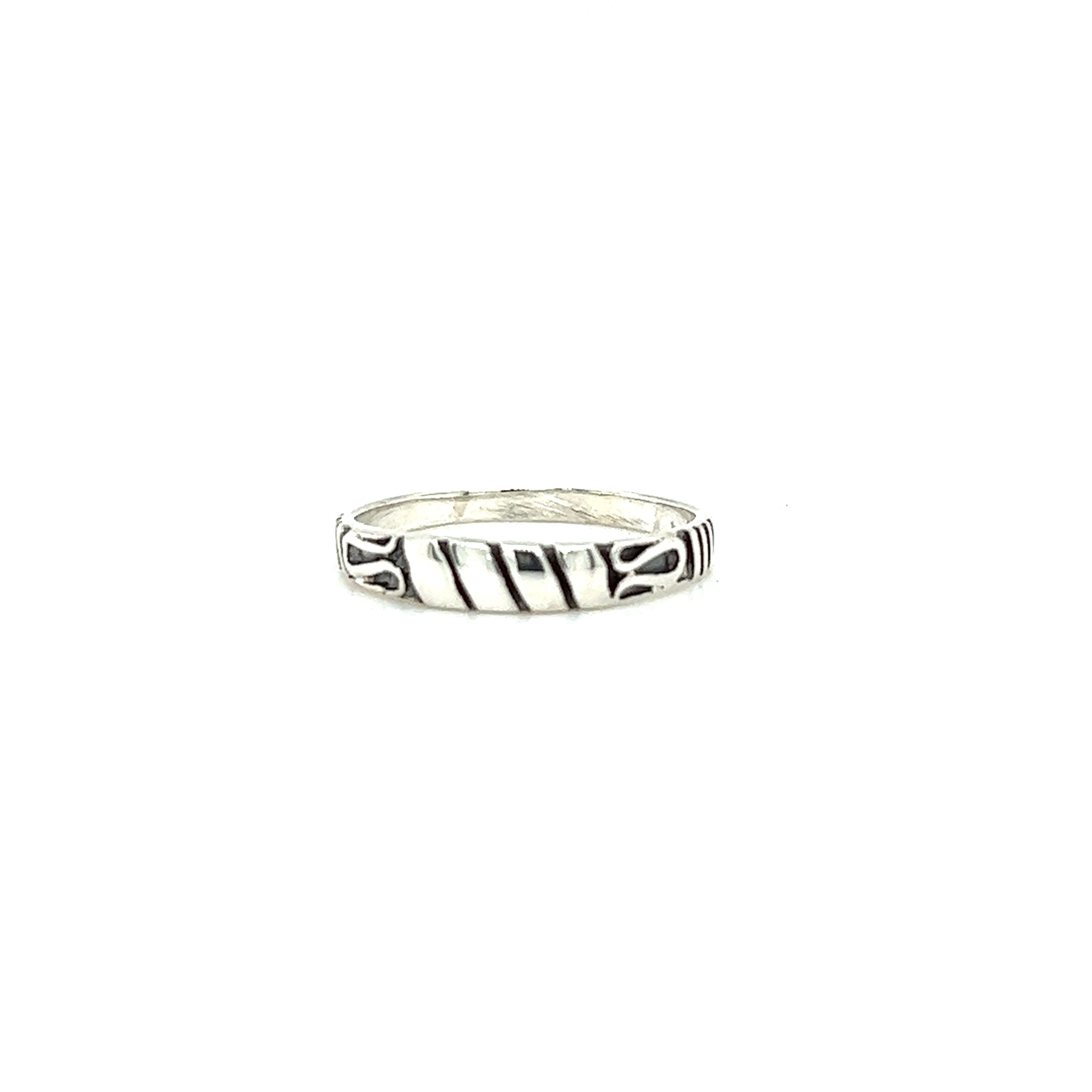 A Super Silver Bali Style Silver Band ring with black and white stripes, perfect for those seeking a bohemian style.