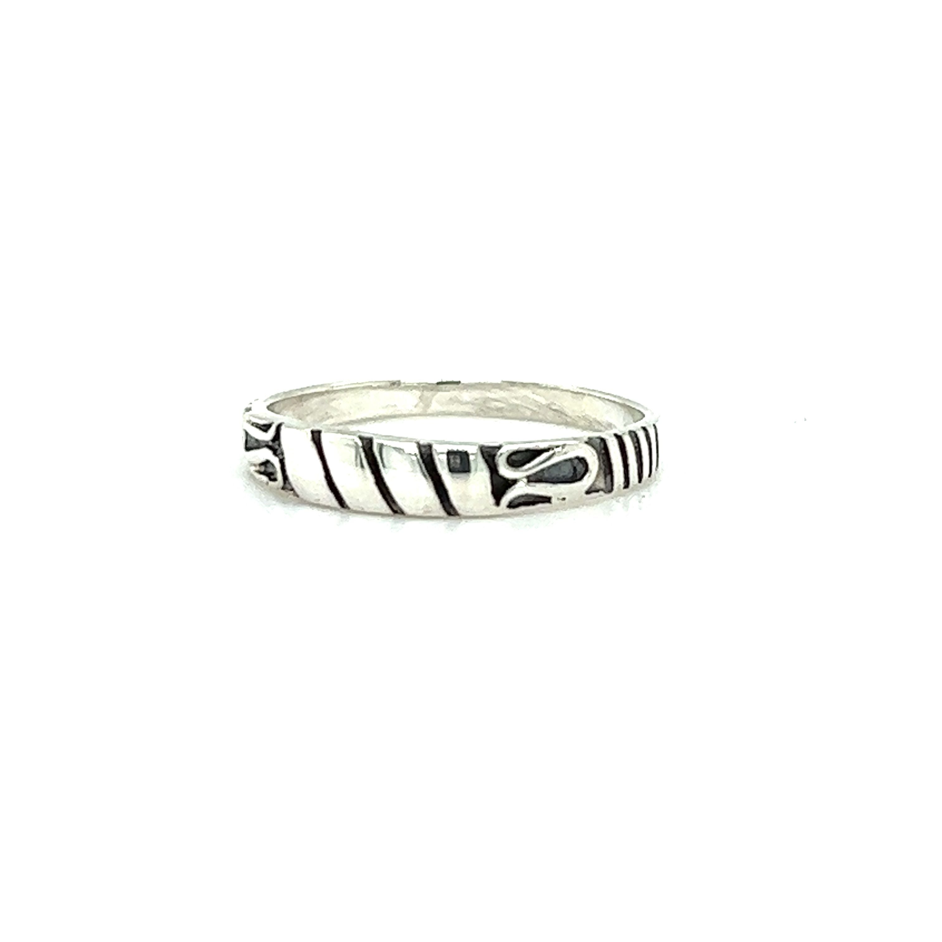 Description: A Super Silver Bali Style Silver Band ring with black and white stripes, featuring a Bali Style Band for a bohemian touch.