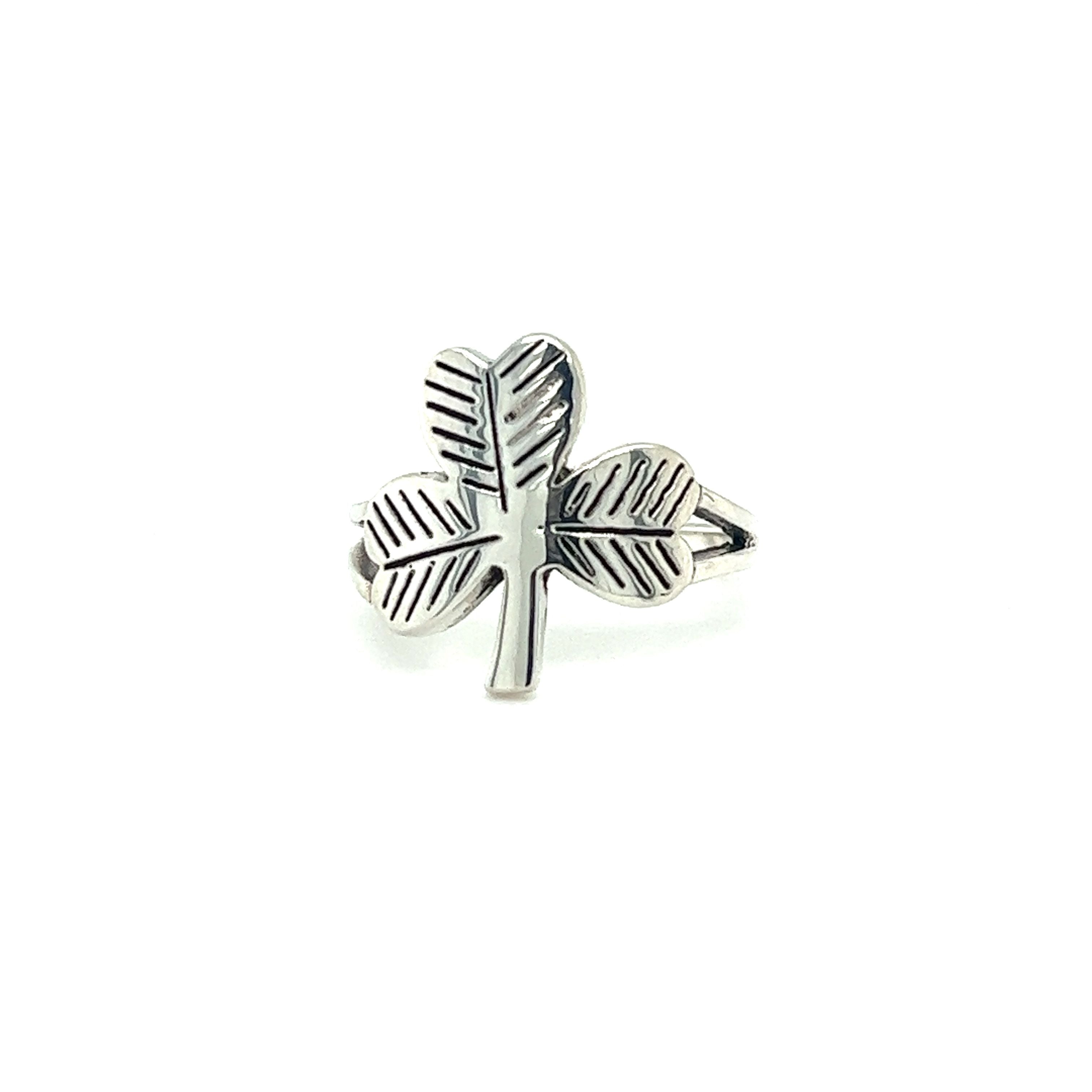 A silver Super Silver Three-Leaf Clover Ring with a shamrock symbolizing faith.