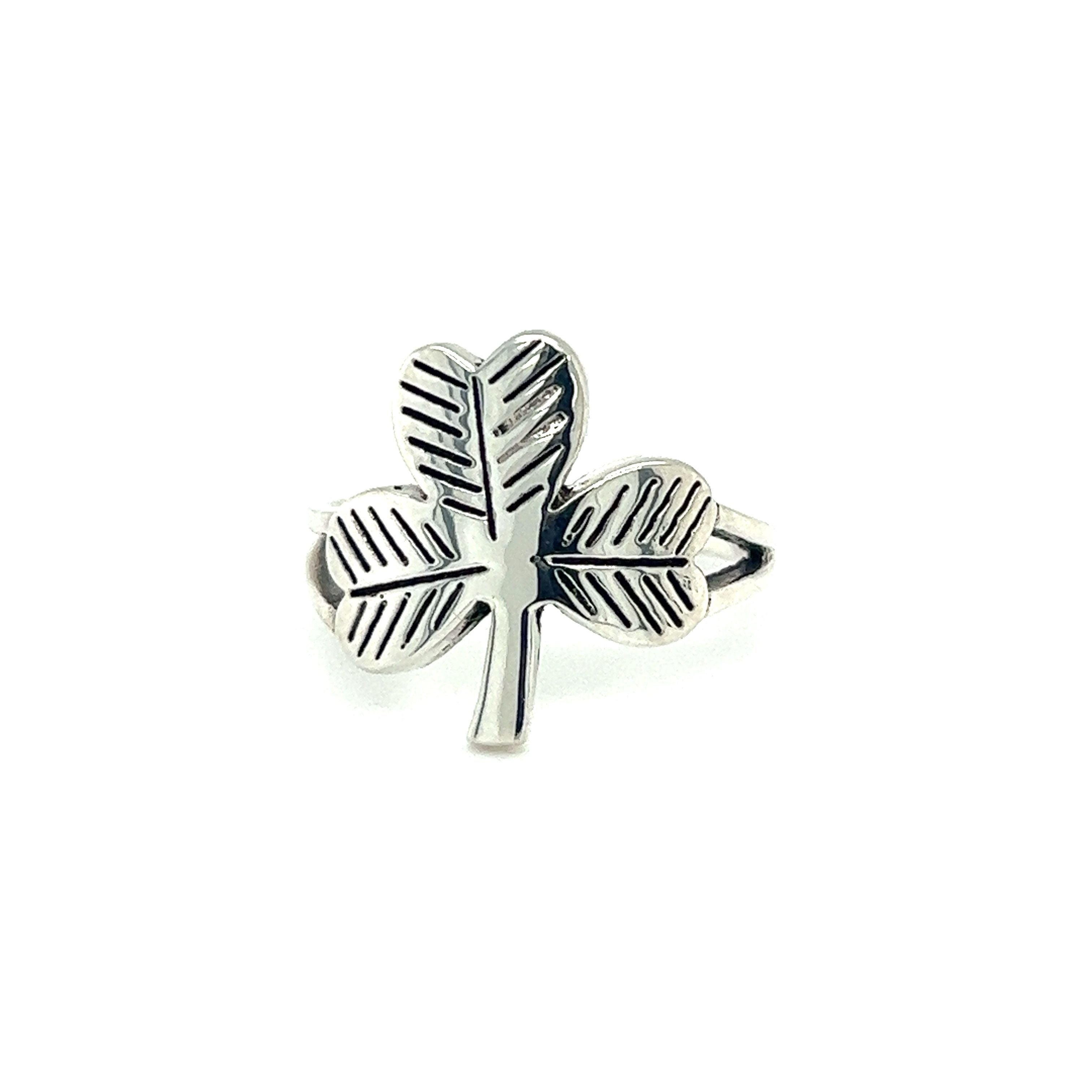 A silver Super Silver Three Leaf Clover Ring.
