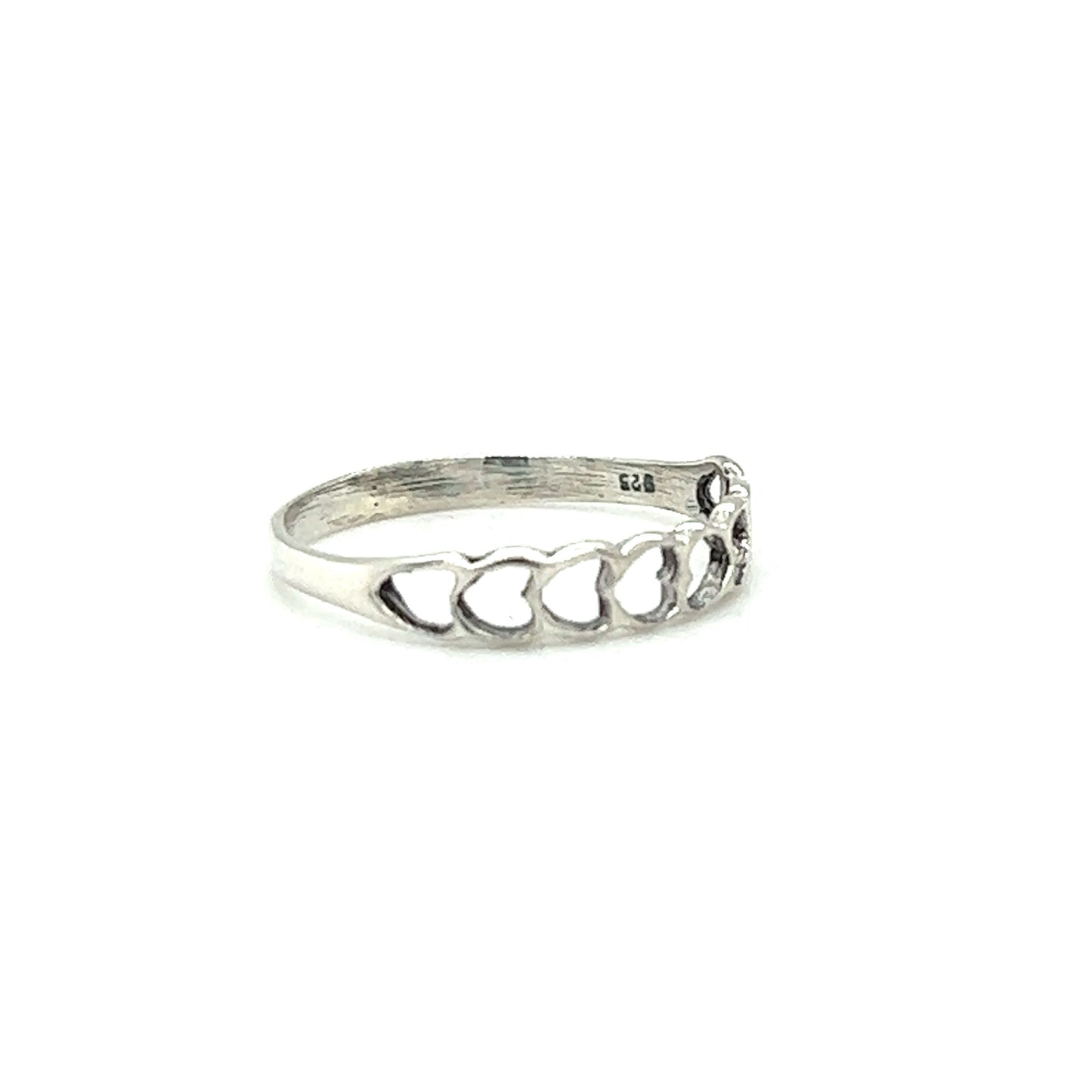 
                  
                    A minimalist Delicate Heart Cutout Band with hearts on it.
                  
                