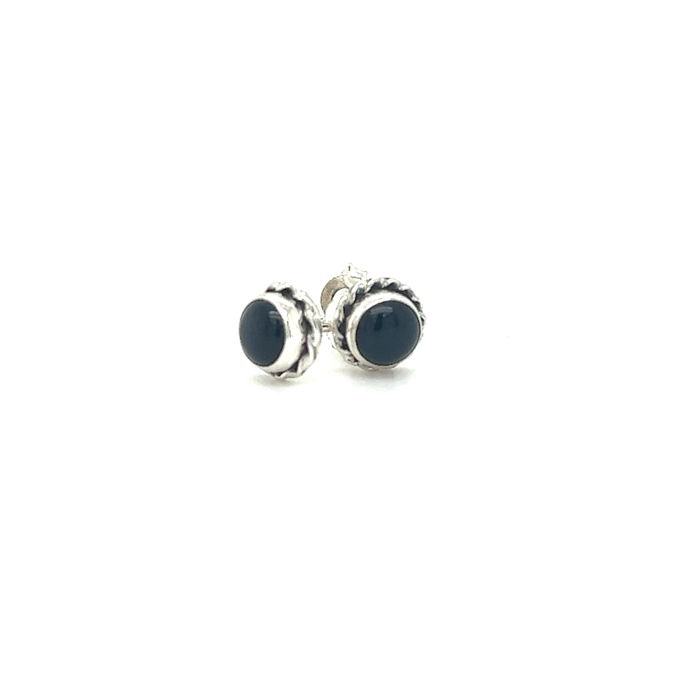 
                  
                    A variety of Round Stone Stud Earrings with Twist Details by Super Silver on a white background.
                  
                