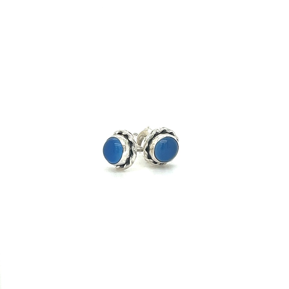 
                  
                    A pair of Round Stone Stud Earrings with Twist Details by Super Silver on a white background.
                  
                