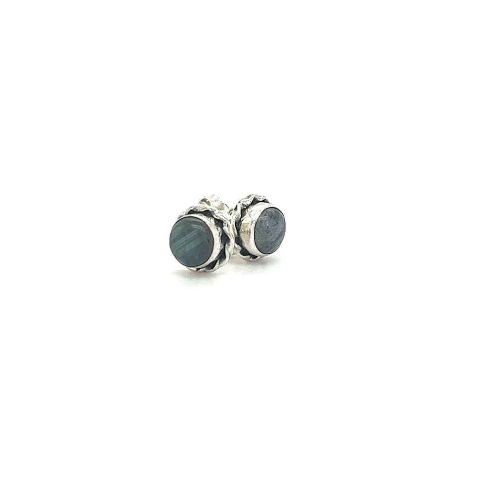 
                  
                    A pair of Super Silver Round Stone Stud Earrings with Twist Details, adding a touch of color to any outfit.
                  
                