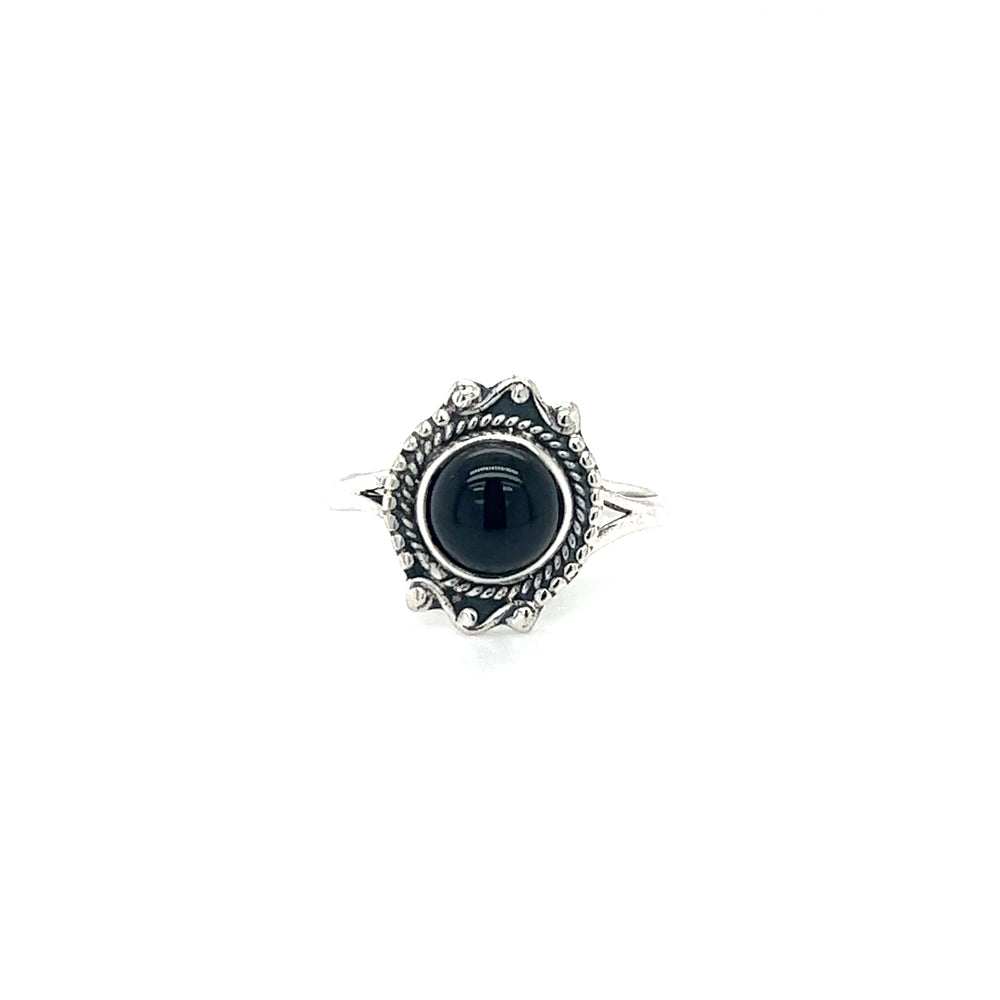 
                  
                    A Round Gemstone Ring With Vintage Setting from Super Silver, featuring a black onyx set in .925 Sterling Silver, exuding bohemian sophistication on a white background.
                  
                
