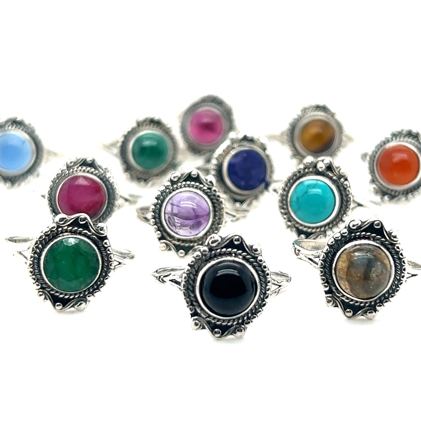 
                  
                    A group of Super Silver Round Gemstone Rings With Vintage Setting on a white background.
                  
                