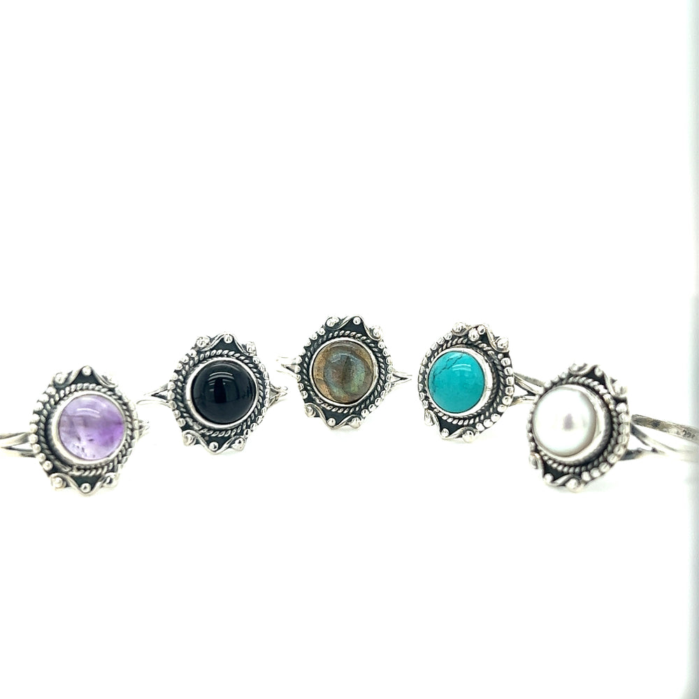 
                  
                    A collection of Super Silver Round Gemstone Rings with Vintage Setting, handcrafted with .925 Sterling Silver for a touch of bohemian sophistication.
                  
                