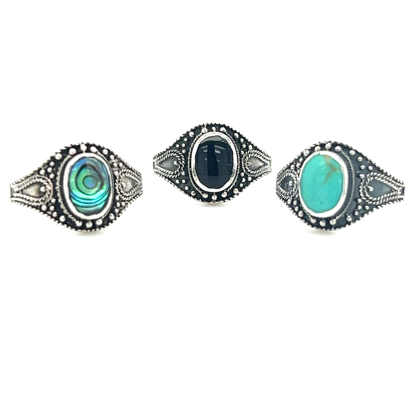 
                  
                    A set of three silver rings with Vintage Style Oval Shield Ring with Inlaid Stones.
                  
                