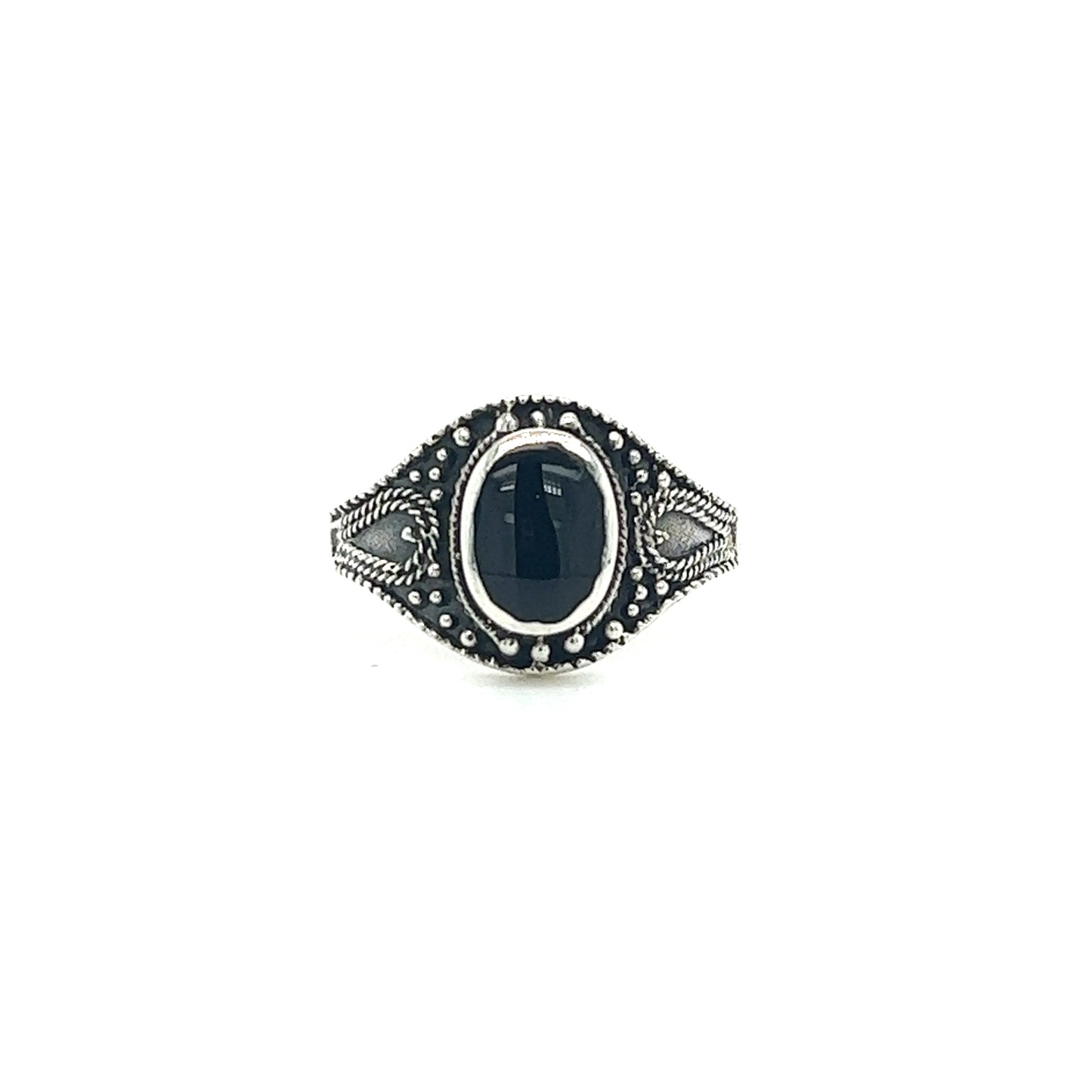 
                  
                    A Vintage Style Oval Shield Ring with Inlaid Stones.
                  
                