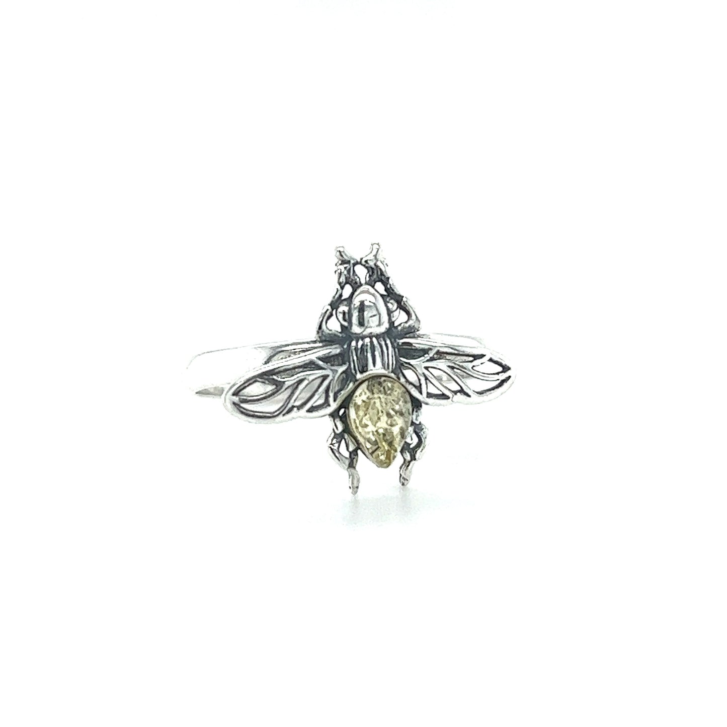 
                  
                    A Detailed Baltic Amber Bee Ring by Super Silver with a silver bee on it.
                  
                