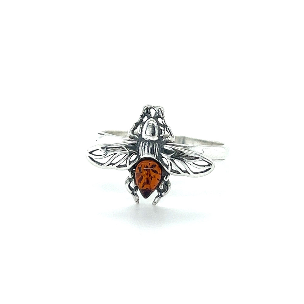 
                  
                    A Detailed Baltic Amber Bee Ring featuring a bee design by Super Silver.
                  
                