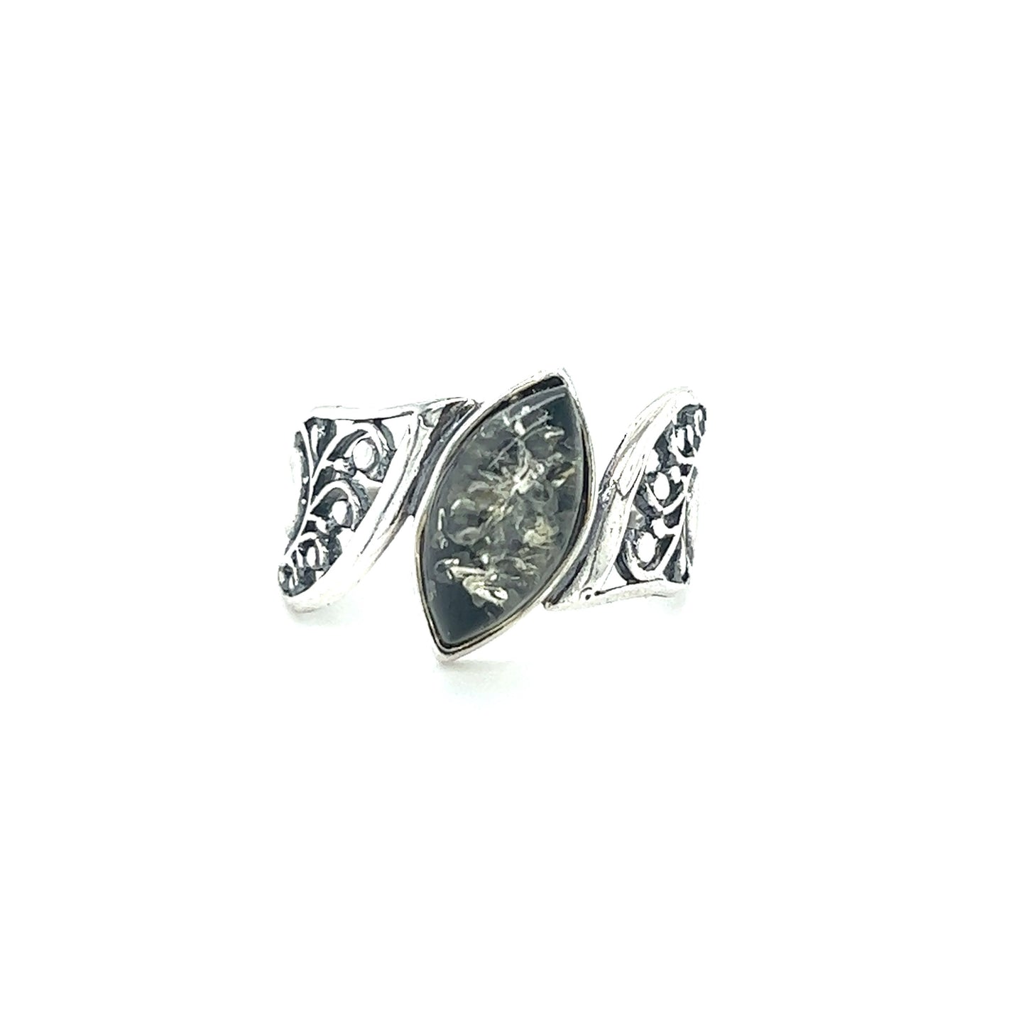 
                  
                    A Wide Filigree Band Baltic Amber Ring with a black stone in the middle by Super Silver.
                  
                
