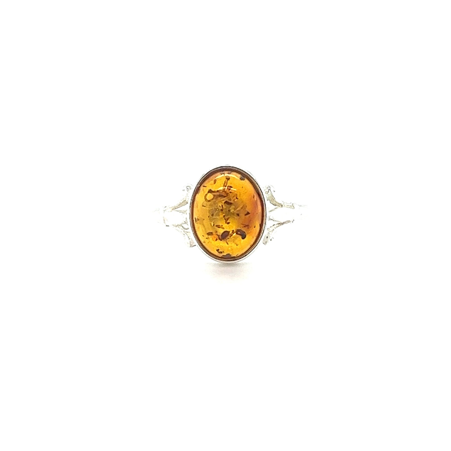 A Glowing Oval Amber Ring from Super Silver on a white background.