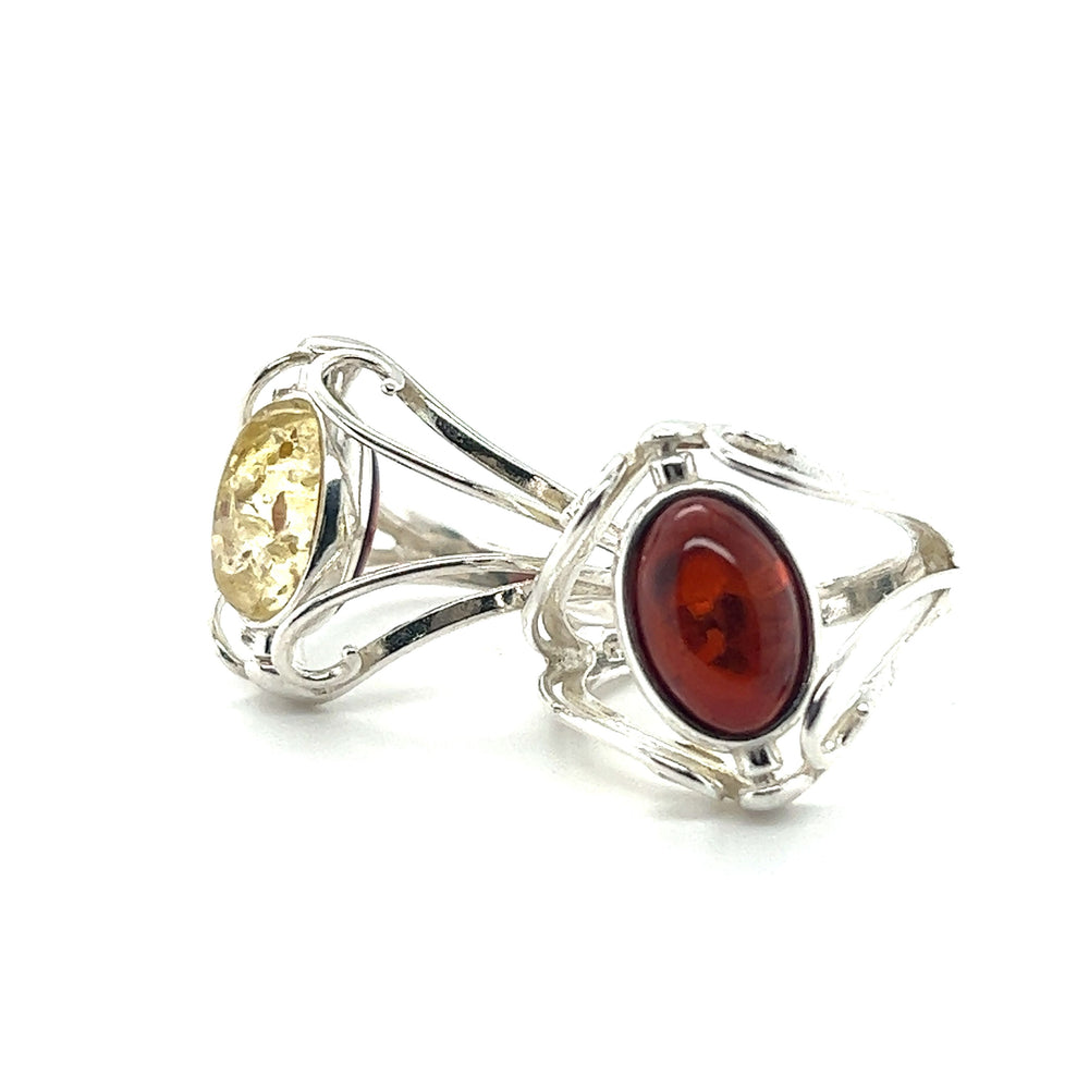 A Rotating Lemon and Cherry Amber Ring with a Baltic amber stone by Super Silver.