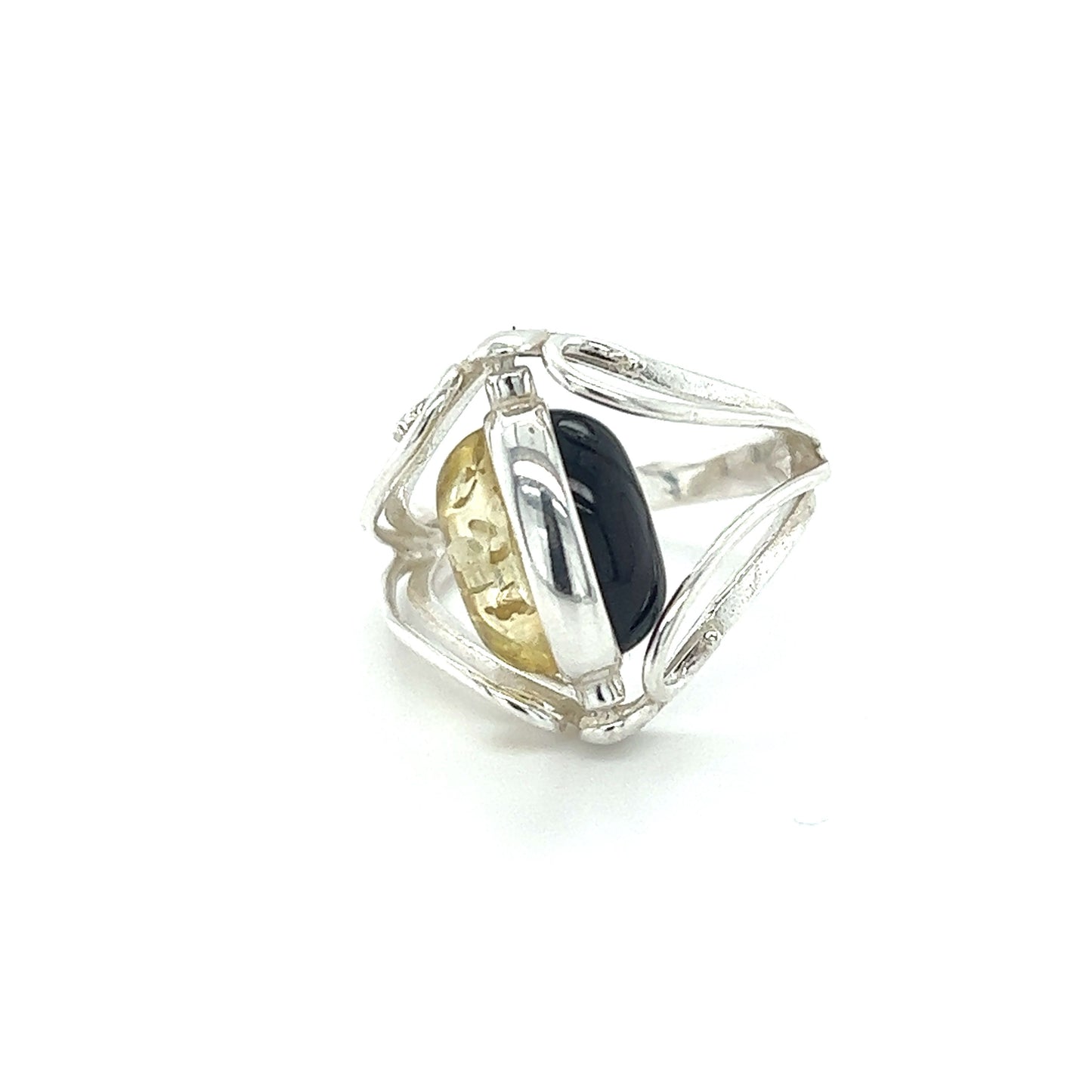 
                  
                    A statement Rotating Lemon and Cherry Amber Ring with a Baltic amber stone in black and yellow by Super Silver.
                  
                