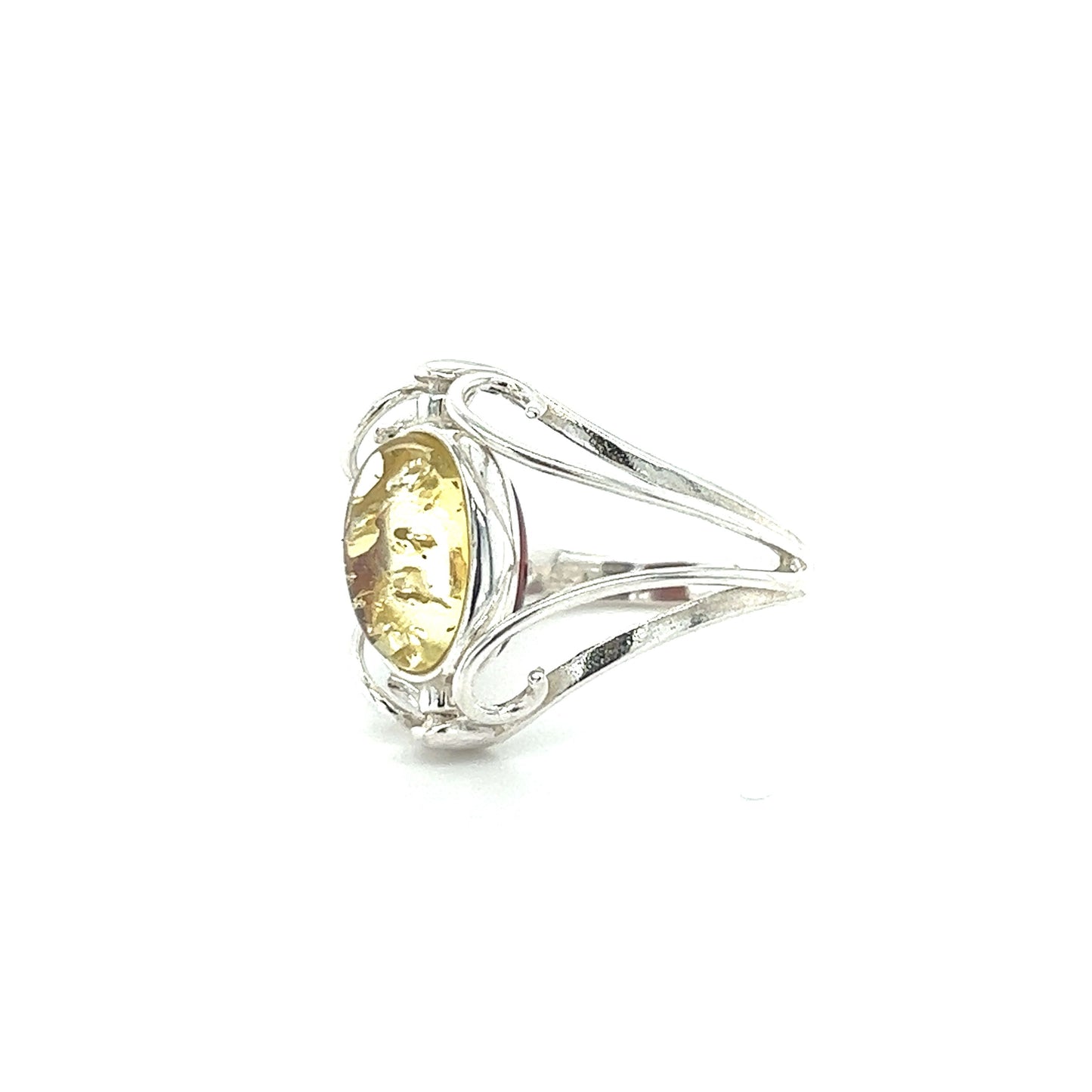 
                  
                    A Rotating Lemon and Cherry Amber Ring made of sterling silver and featuring a yellow citrine stone.
                  
                