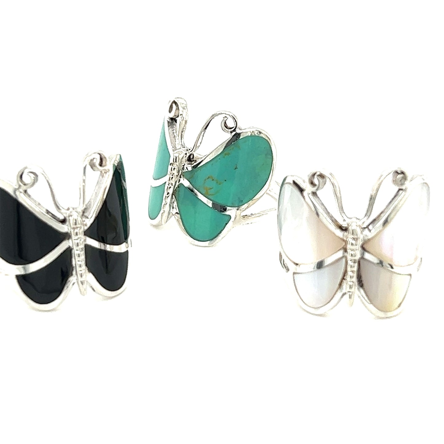 
                  
                    Bold Butterfly Ring with Inlaid Stones with turquoise inlay and black onyx.
                  
                