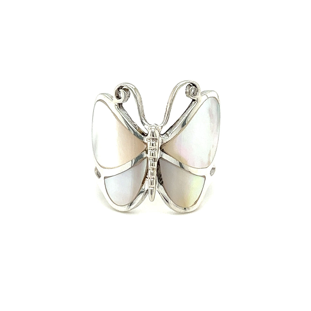 
                  
                    A Bold Butterfly Ring with Inlaid Stones with a mother of pearl stone on a white background.
                  
                