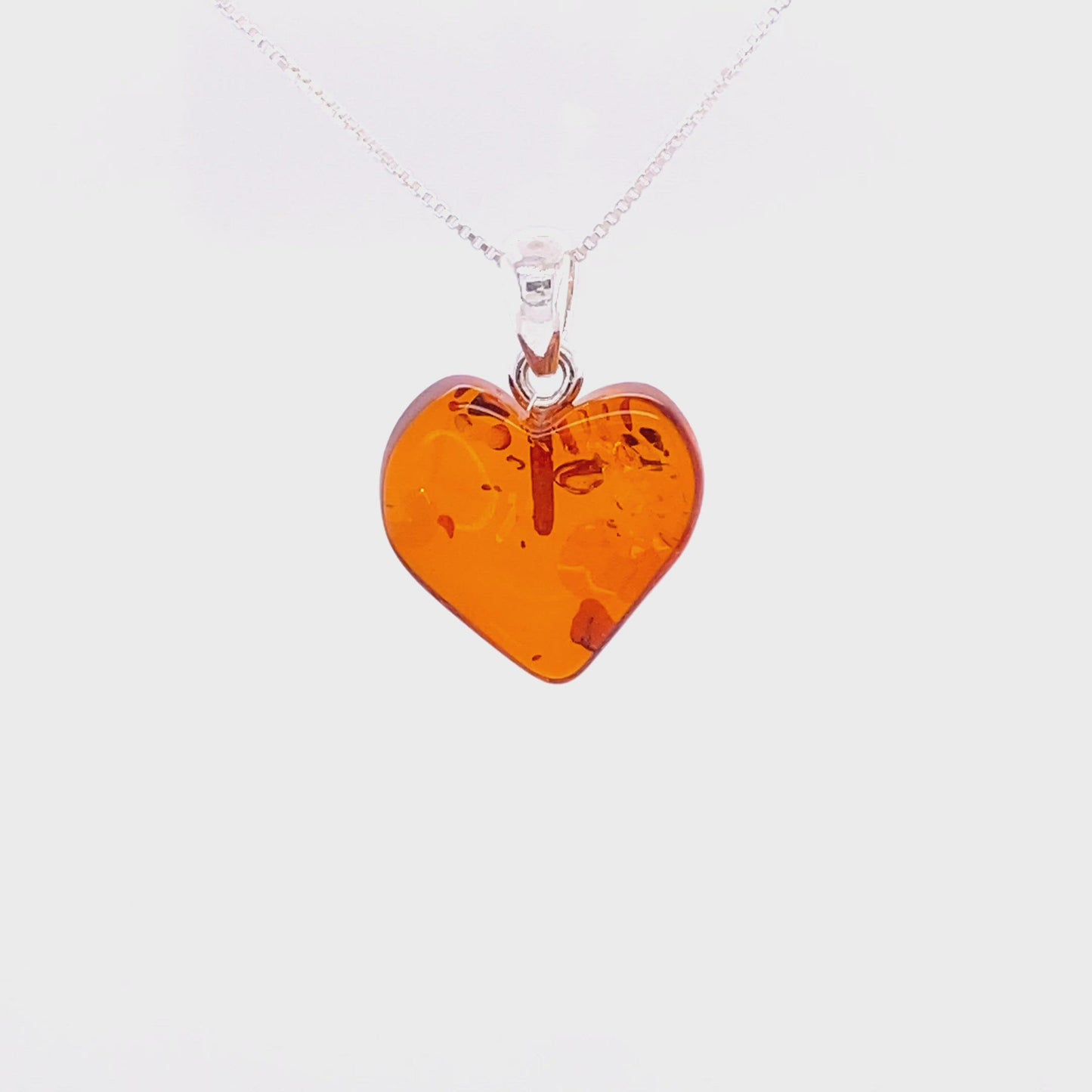 
                  
                    Load and play video in Gallery viewer, Charming Baltic Amber Heart Pendant
                  
                