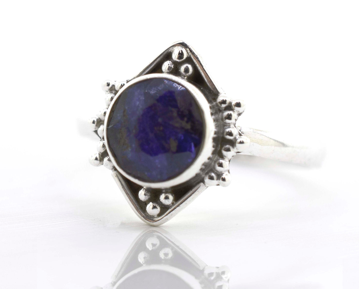 
                  
                    A Super Silver round gemstone ring with oxidized diamond shape pattern.
                  
                