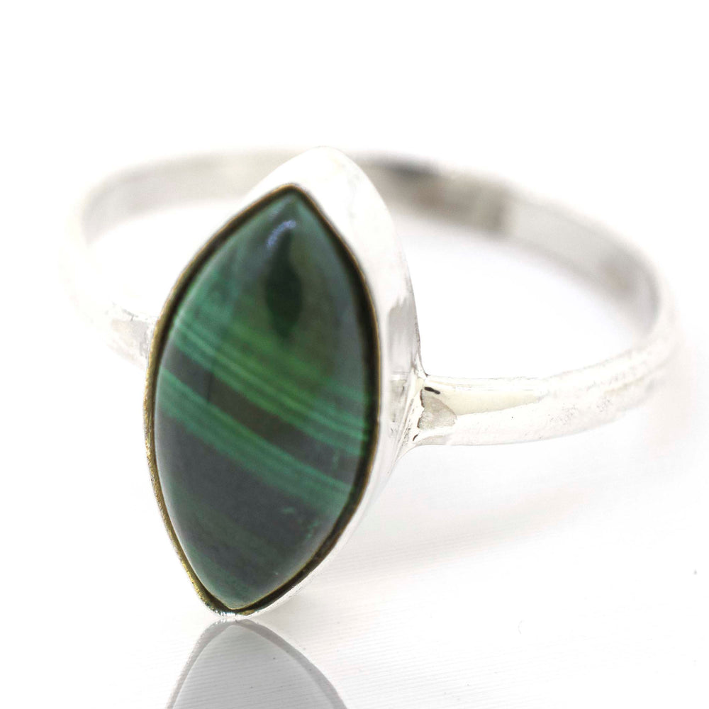 
                  
                    A Super Silver Simple Marquise Shaped Gemstone Ring with a green gemstone.
                  
                