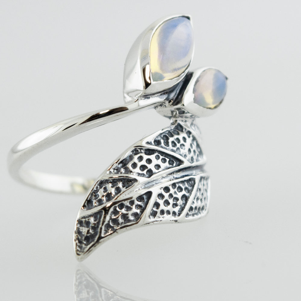 A Leaf Ring with Ethiopian Opal crafted in 925 Sterling Silver, adorned with delicate leaves by Super Silver.