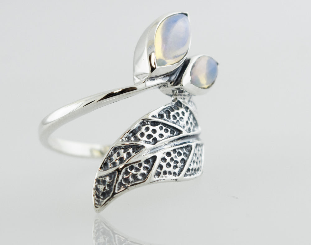 
                  
                    A Leaf Ring with Ethiopian Opal crafted in 925 Sterling Silver, adorned with delicate leaves by Super Silver.
                  
                