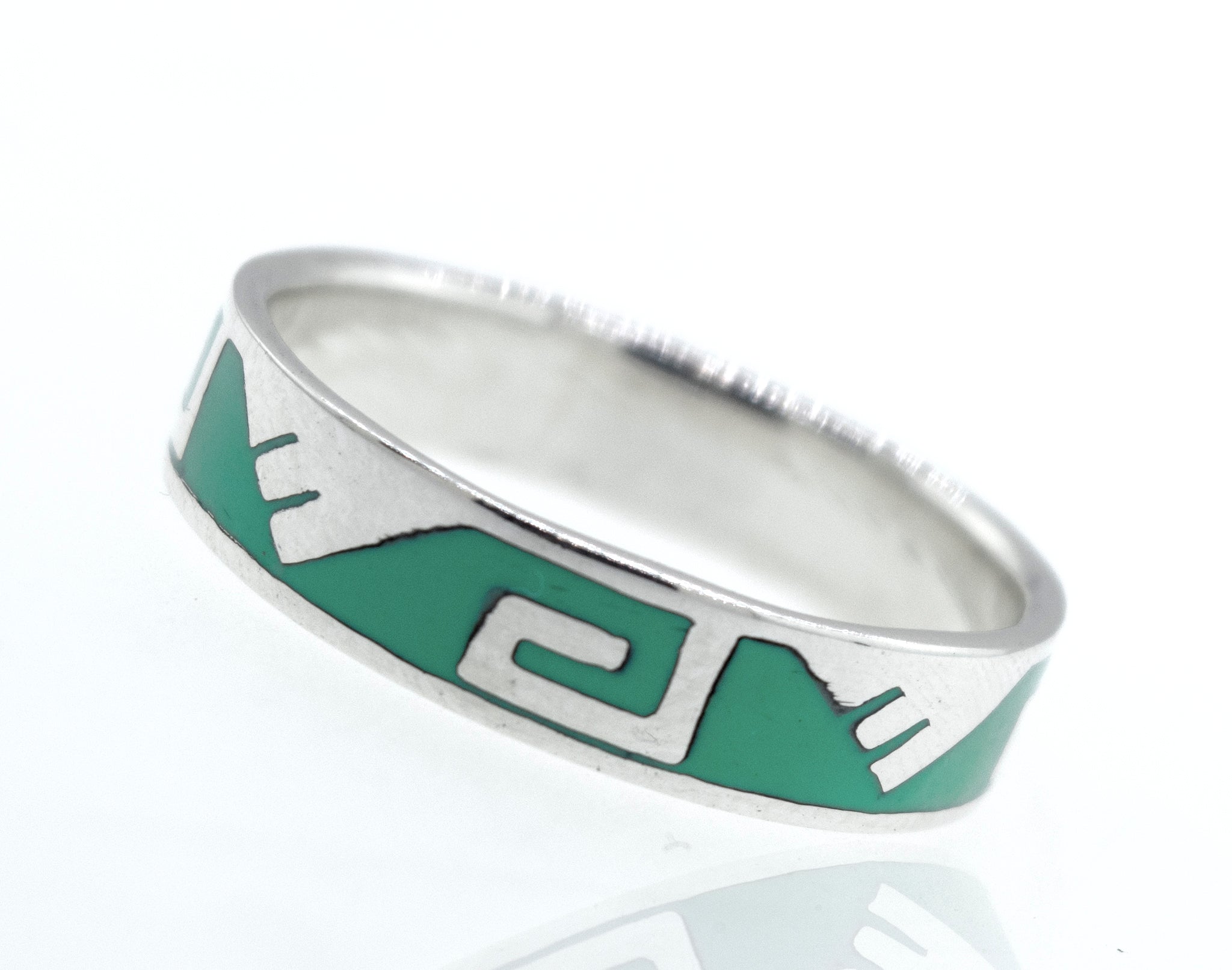 A Greek Wave and Mountain Turquoise Ring with a Grecian wave design by Super Silver.