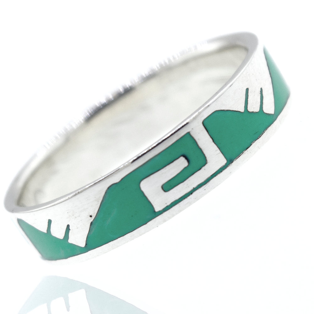 
                  
                    A Greek Wave and Mountain Turquoise Ring with a Super Silver design.
                  
                