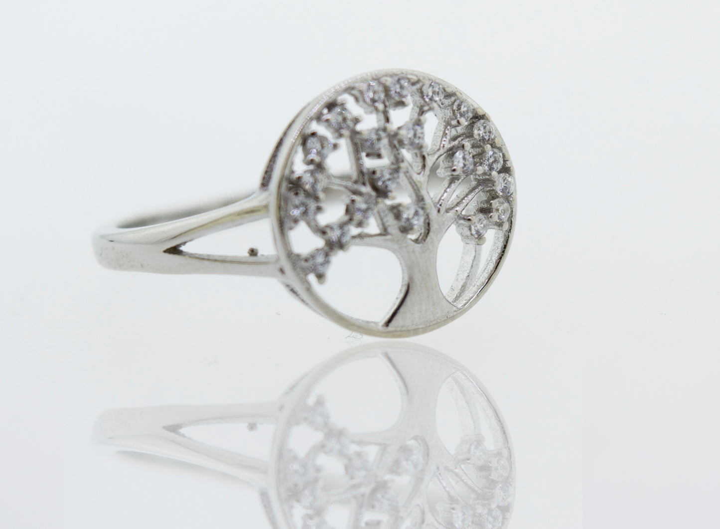 A sterling silver Tree Of Life Ring Cubic Zirconia Stones with diamonds.
