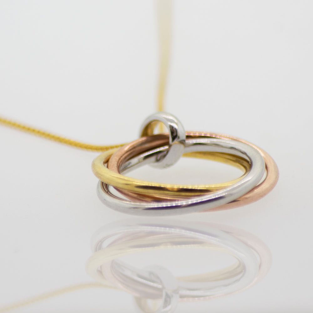 
                  
                    This description features a Simple and Elegant Gold and Rose Gold Plated Pendant necklace from Super Silver.
                  
                