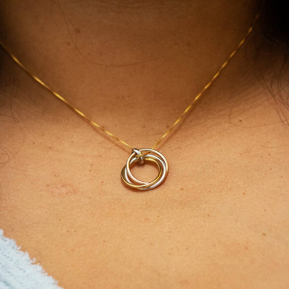 
                  
                    A woman's neck adorned with a Super Silver Simple and Elegant Gold and Rose Gold Plated Pendant necklace.
                  
                
