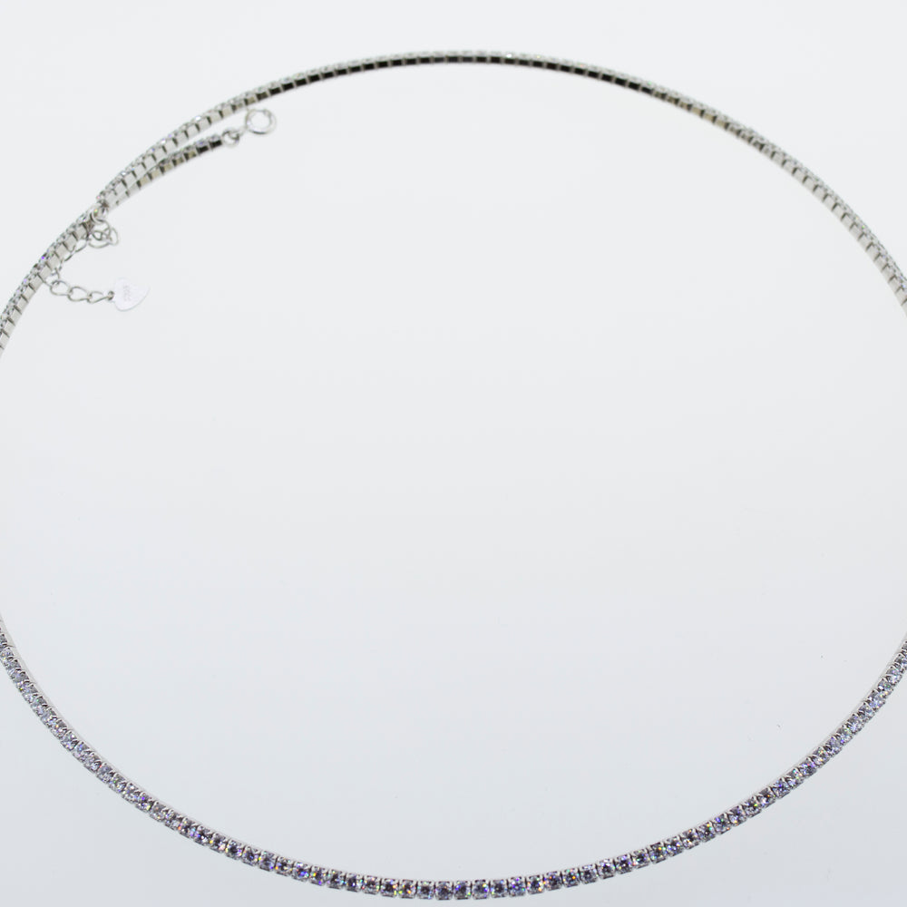 
                  
                    A Super Silver cubic zirconia tennis necklace on a white background.
                  
                