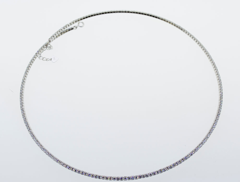 
                  
                    A Super Silver cubic zirconia tennis necklace on a white background.
                  
                