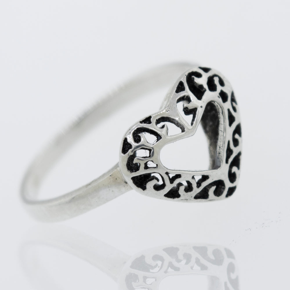 
                  
                    An ornate Heart Shaped Ring with Filigree Detailing, perfect for expressing love and ideal for engagement.
                  
                