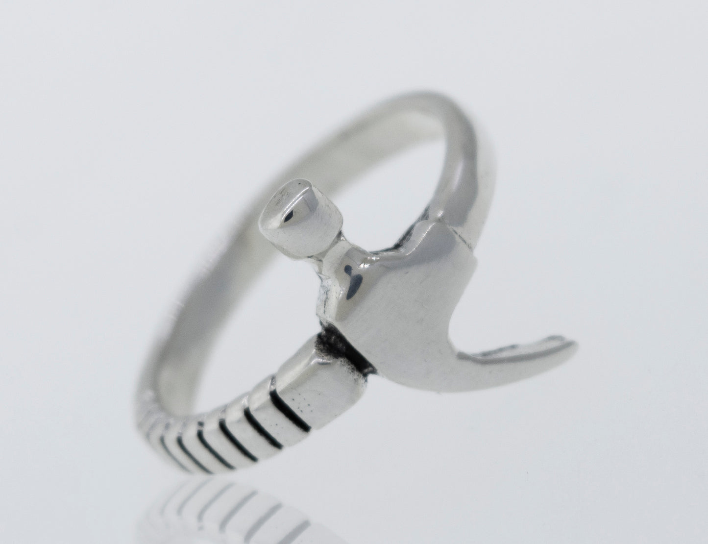 An adjustable Super Silver Hammer Ring featuring a hammered design.