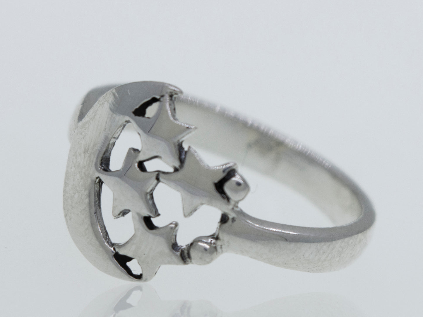 A Super Silver Crescent Moon Ring with Four Stars adorned with stars and a crescent moon.