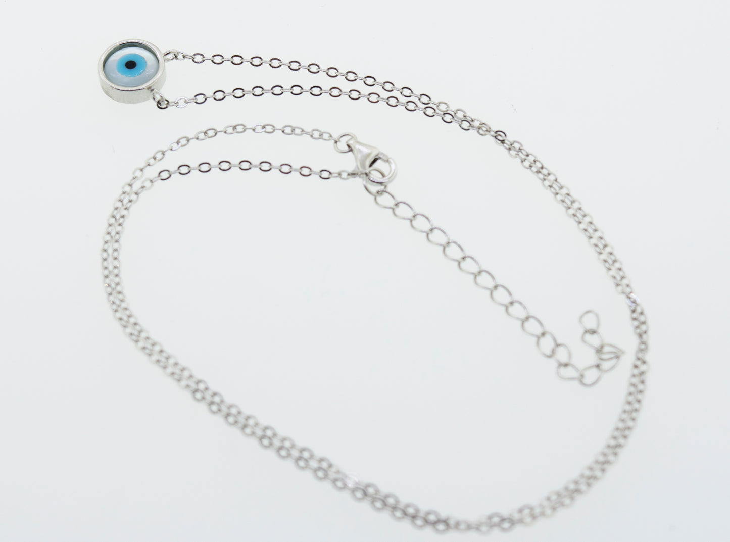 An adjustable chain necklace with a Simple Evil Eye pendant, crafted in .925 Sterling Silver by Super Silver.