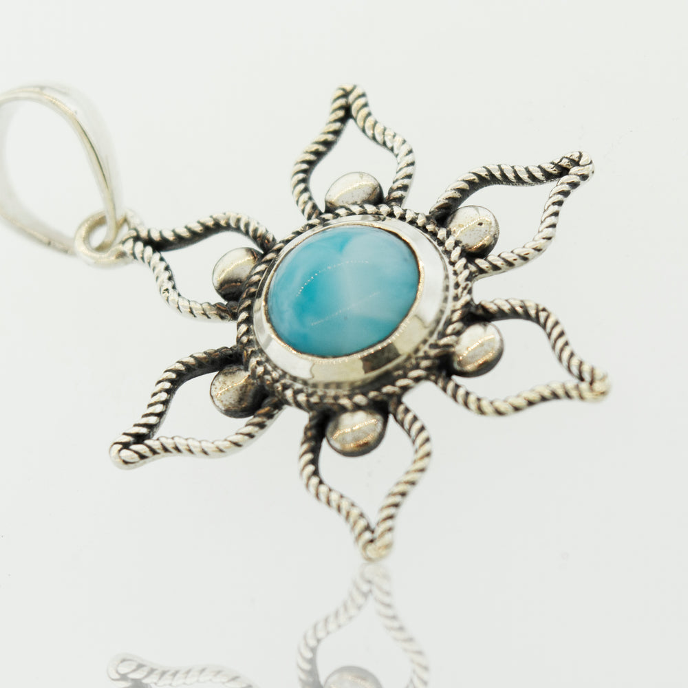 A Super Silver Larimar Flower Pendant, perfect for a beach day.