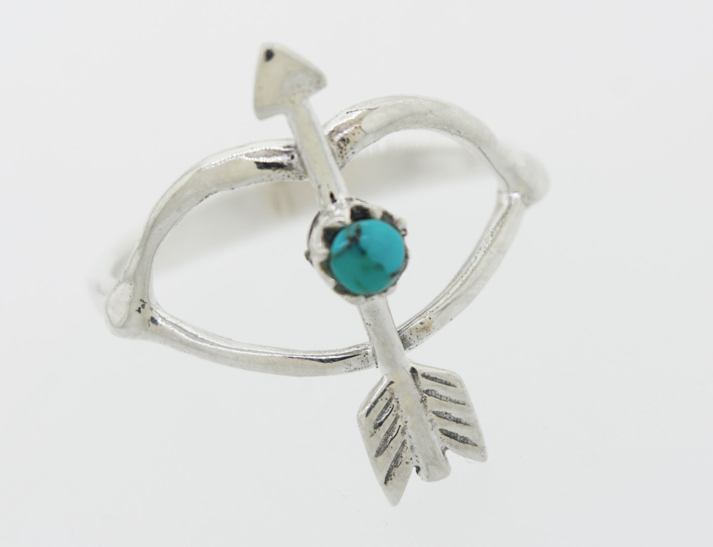 A Super Silver Turquoise Stone Ring With Bow And Arrow Design.