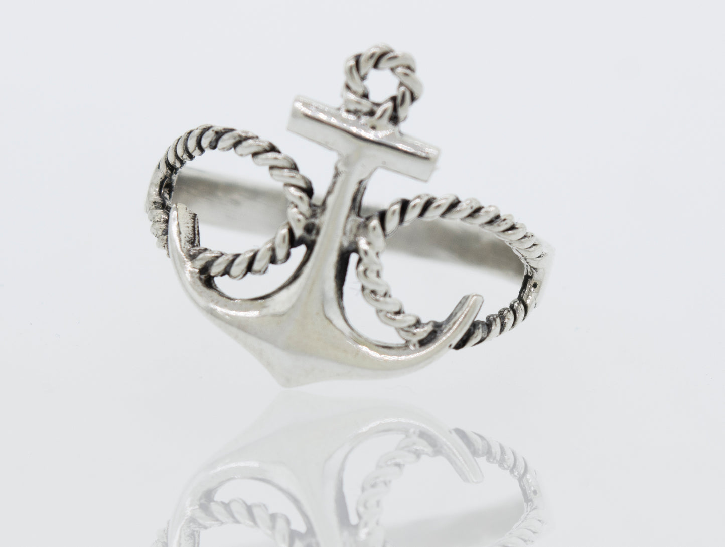 
                  
                    A Super Silver sterling silver anchor ring featuring an open-loop rope design on a white surface.
                  
                