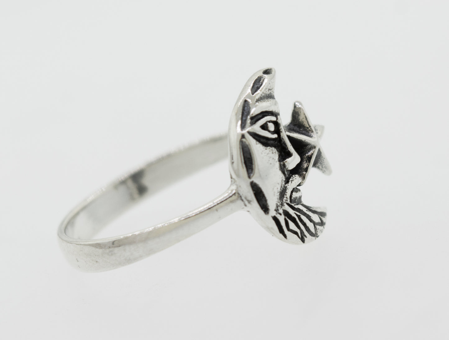 
                  
                    A Man In the Moon ring made of .925 Sterling Silver with a face in the moon, by Super Silver.
                  
                