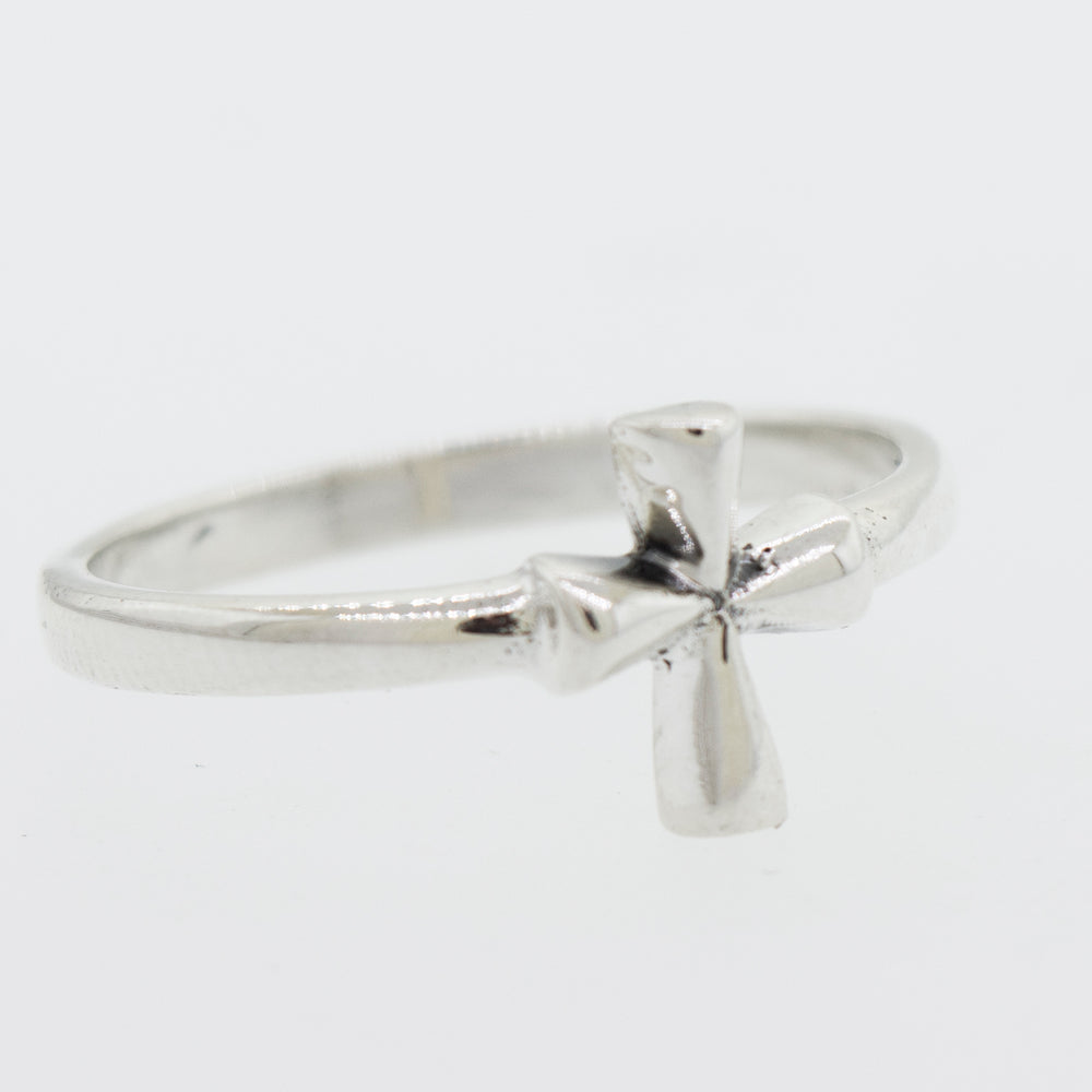 
                  
                    A vertical Simple Cross Ring by Super Silver on a white background.
                  
                
