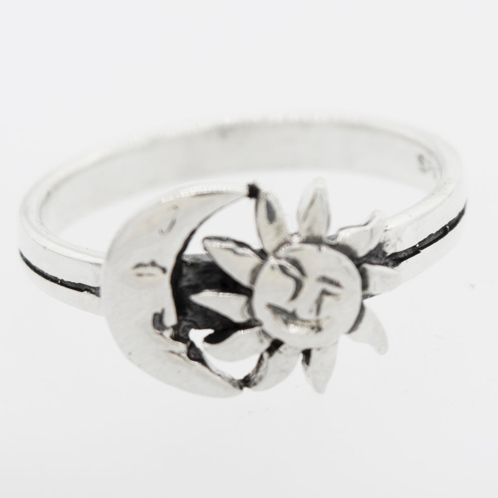 
                  
                    An oxidized Super Silver ring adorned with the delicately designed celestial duo, Moon And Sun With Face.
                  
                