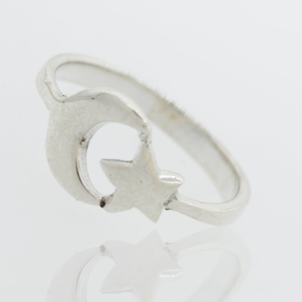 A Super Silver Crescent Moon And Star Ring.