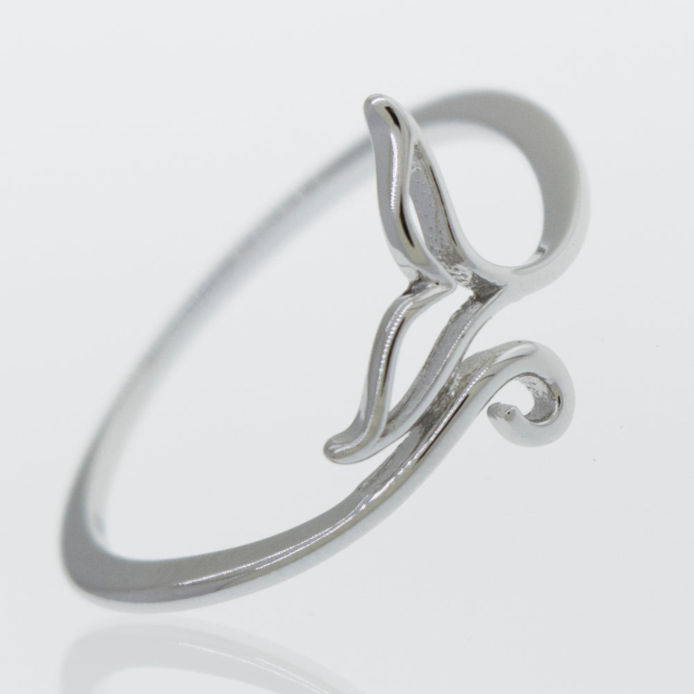 A minimalist Whale Tail Ring with a wave design, inspired by the Santa Cruz coastline.