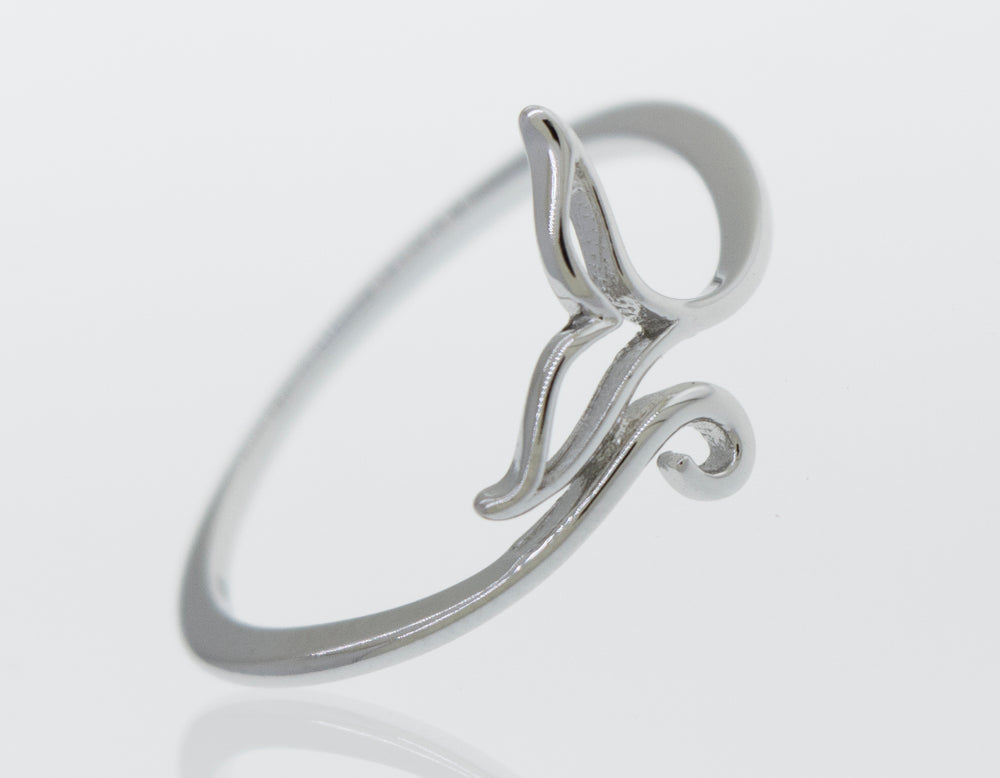 A minimalist Whale Tail Ring with a wave design, inspired by the Santa Cruz coastline.