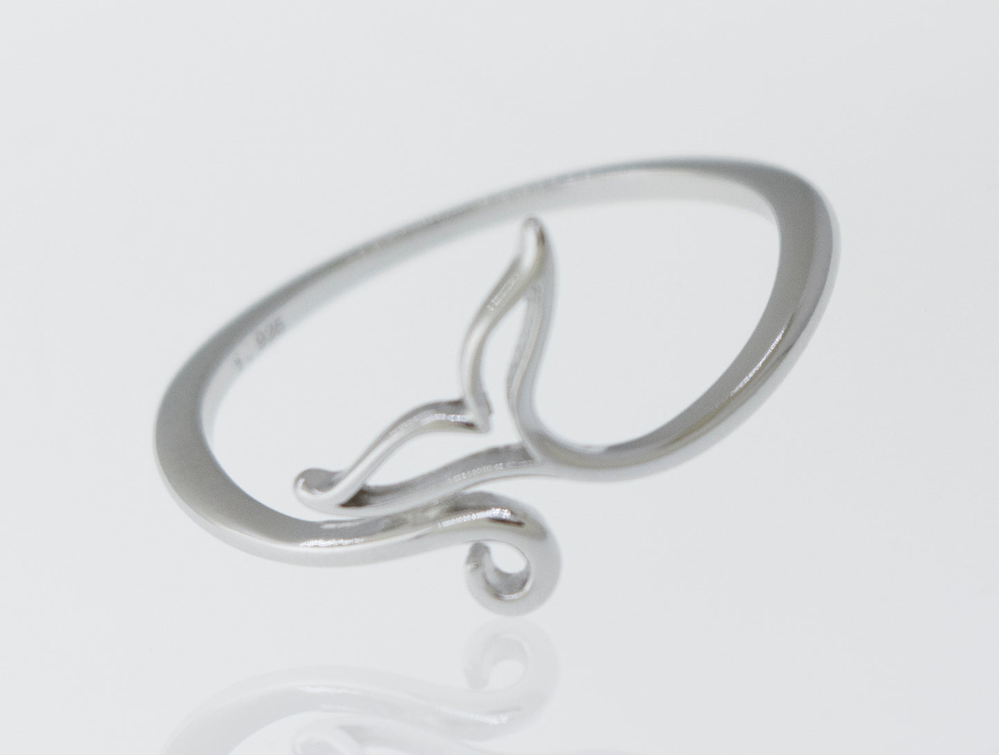 A sterling silver Whale Tail Ring, evoking the beauty of the ocean.
